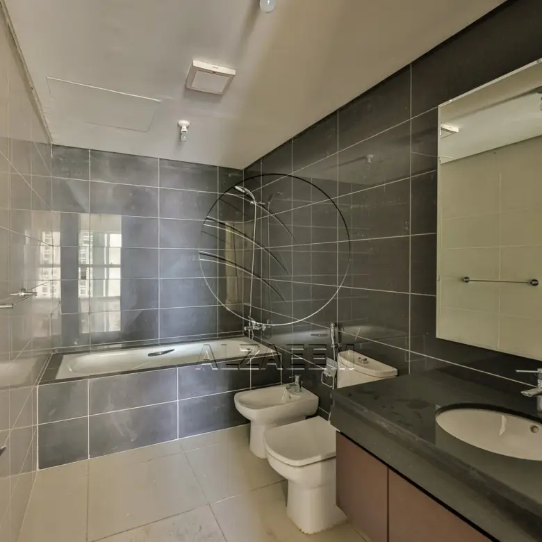 Apartment for sale in Burooj Views, Marina Square. Rented till 14/07/2026 | Price Dropped | High Floor | Balcony | Open kitchen with window