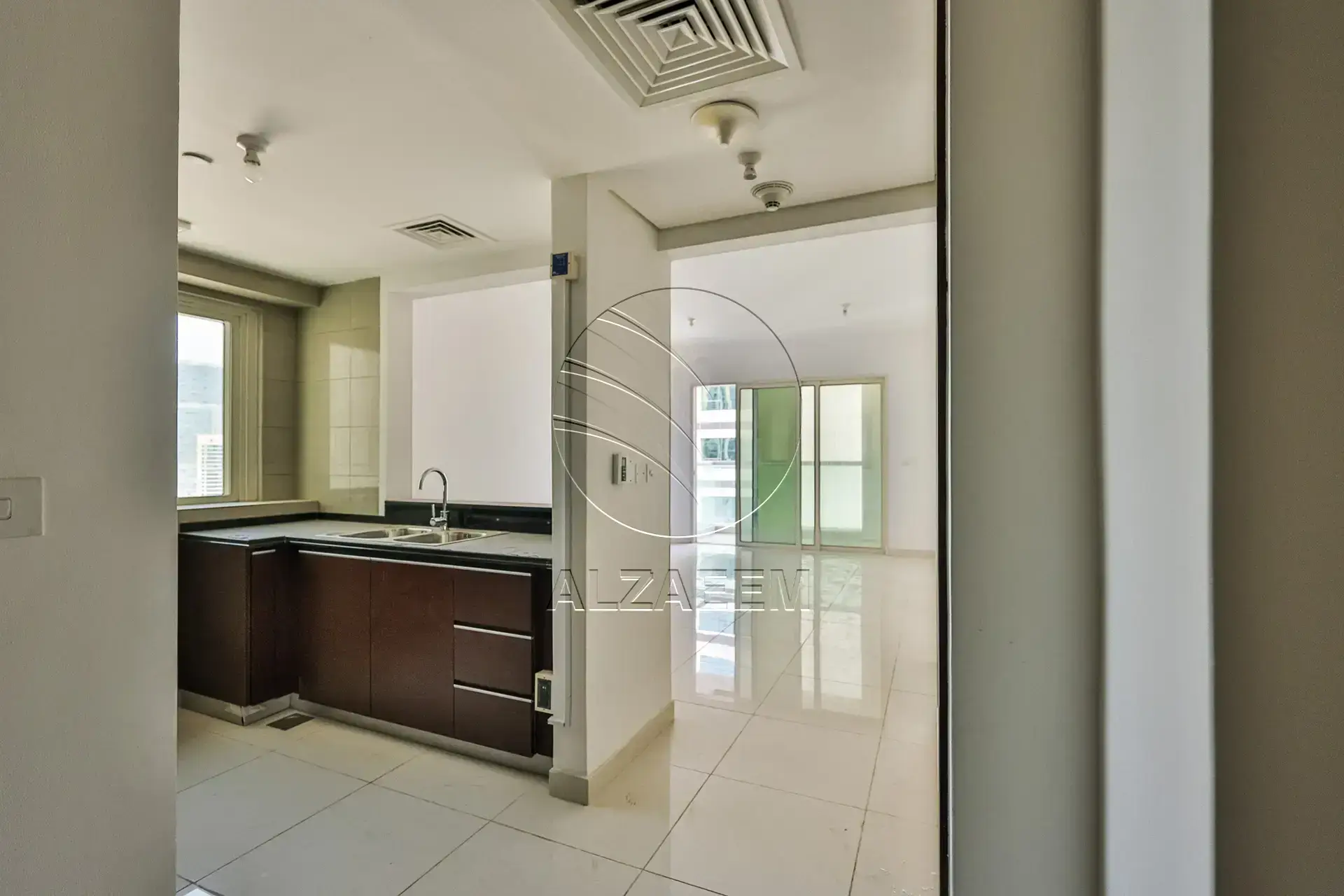 Apartment for sale in Burooj Views, Marina Square. Rented till 14/07/2026 | Price Dropped | High Floor | Balcony | Open kitchen with window