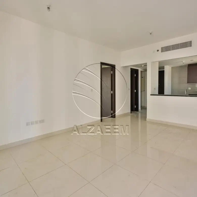 Apartment for sale in Burooj Views, Marina Square. Rented till 14/07/2026 | Price Dropped | High Floor | Balcony | Open kitchen with window