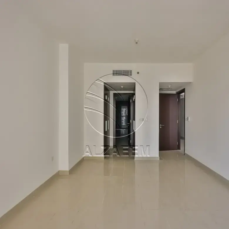 Apartment for sale in Burooj Views, Marina Square. Rented till 14/07/2026 | Price Dropped | High Floor | Balcony | Open kitchen with window