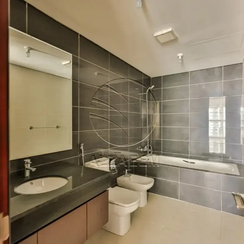 Apartment for sale in Burooj Views, Marina Square. Rented till 14/07/2026 | Price Dropped | High Floor | Balcony | Open kitchen with window