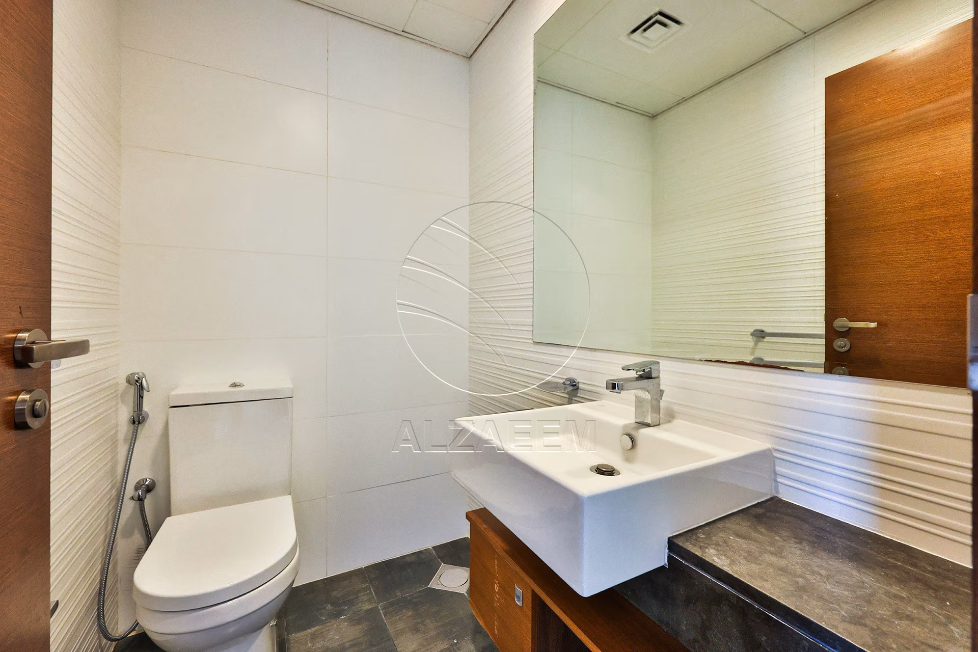 Lower Floor Unit | VACANT | Road View