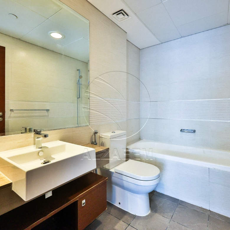 Lower Floor Unit | VACANT | Road View