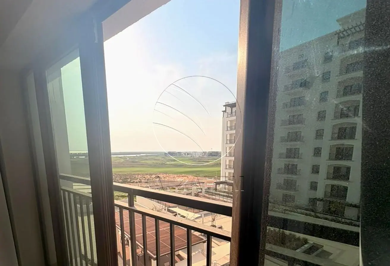 Studio mid floor + Partial Golf View and Community