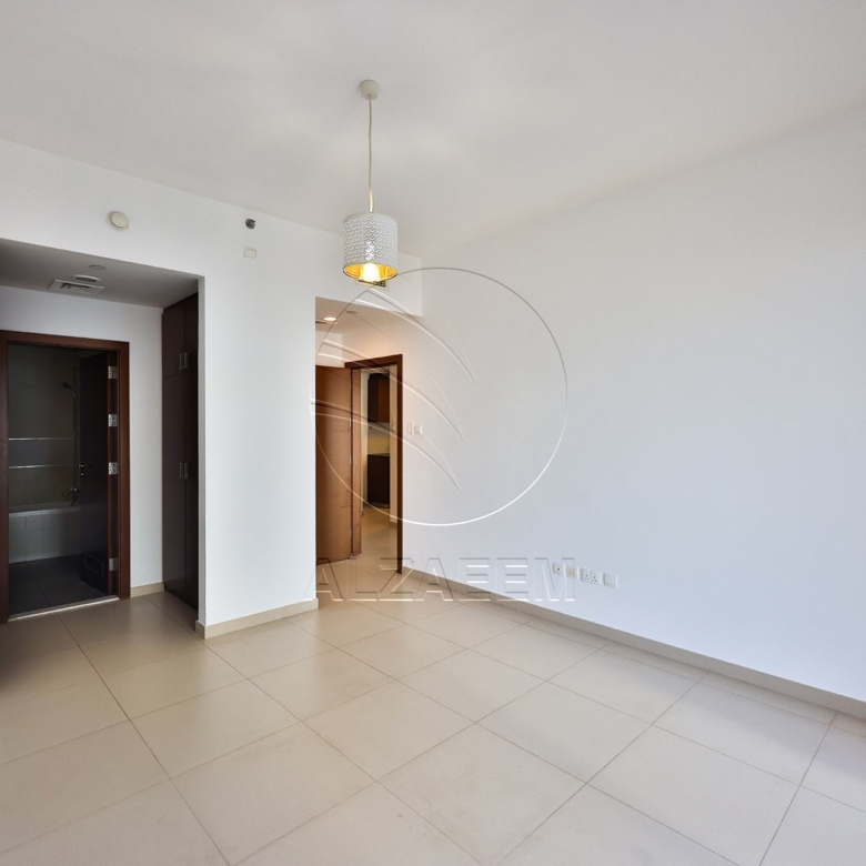 Lower Floor Unit | VACANT | Road View
