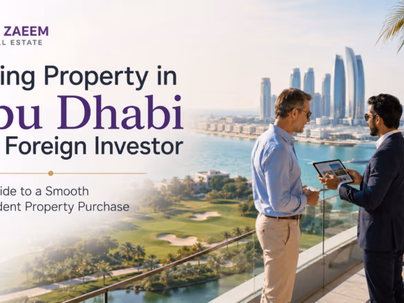 Al Zaeem Real Estate advisor discussing property buying in Abu Dhabi with a foreign investor overlooking a waterfront community