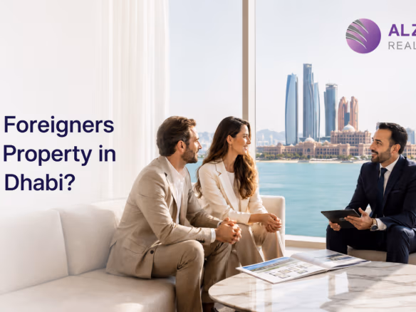 International buyers consulting a real estate advisor about purchasing property in Abu Dhabi.